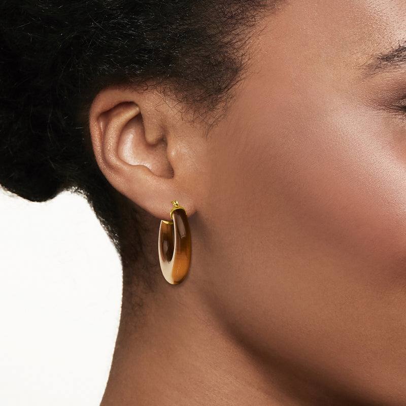 Worn tiger eye hoop earrings in 14kt yellow gold, small oval hoops with brown stone.