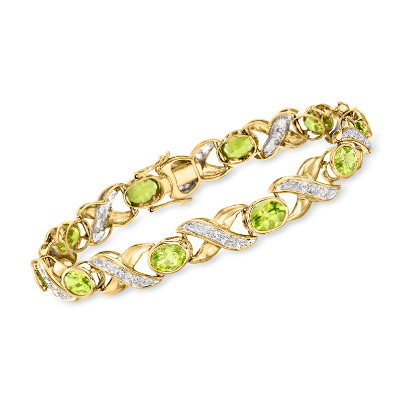 Vintage XO bracelet in 14kt yellow gold with green peridot stones and diamond accents