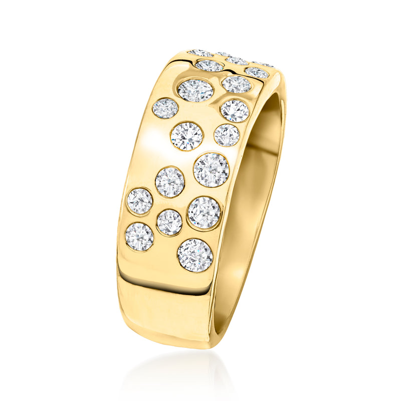 Gold ring with scattered round diamonds on a wide band, angled view