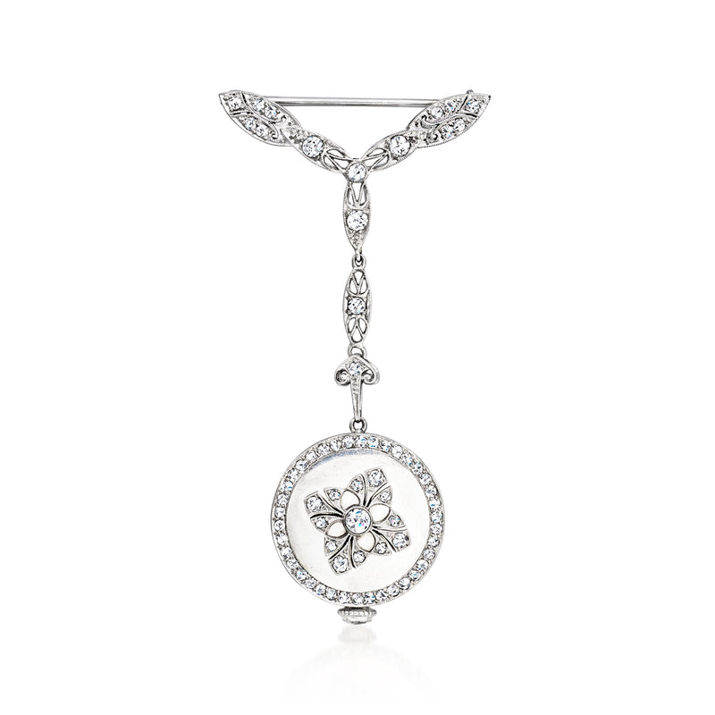 Platinum watch fob pin with round diamond dial and ornate floral top, hanging dangle