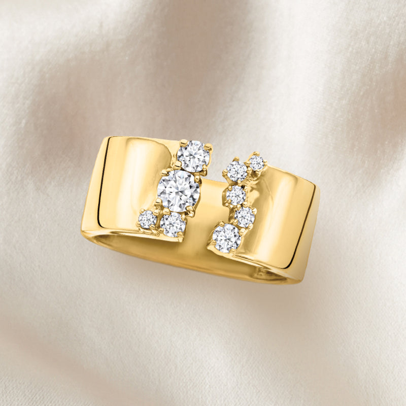 Gold over sterling open-space ring with offset round lab diamonds in clusters