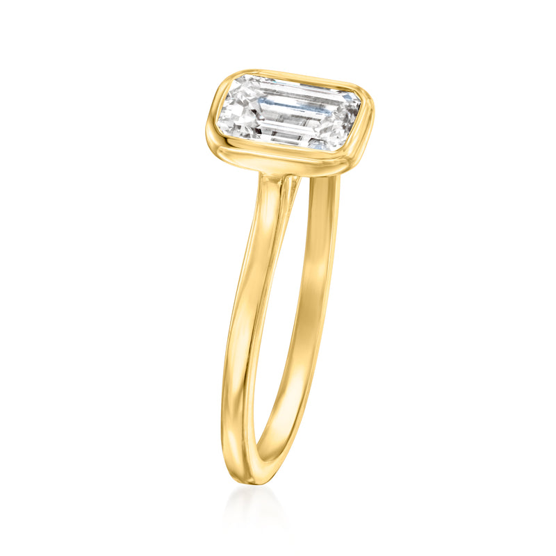 14kt yellow gold ring with raised emerald-cut diamond, tapered open band