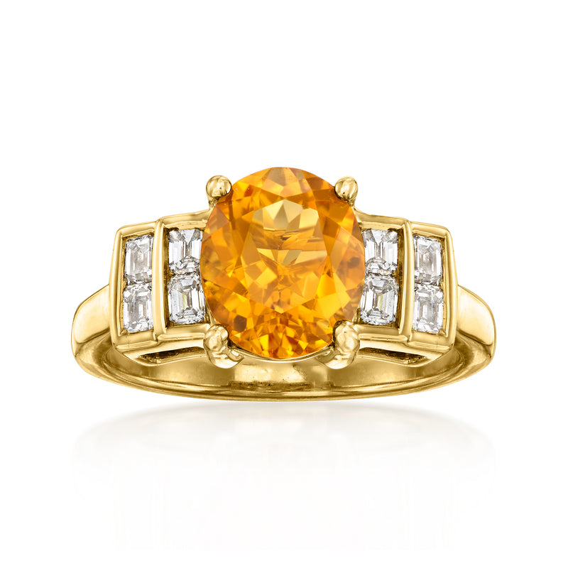 Vintage 14kt yellow gold ring with oval citrine center and diamond baguette side stones