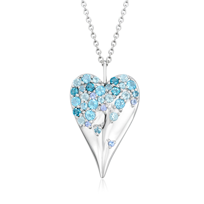 Sterling silver heart pendant necklace with light blue gemstone cluster