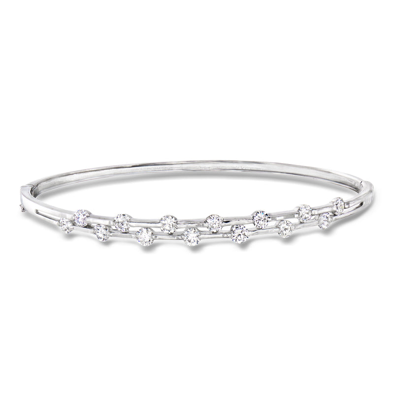 14kt white gold two-row bangle bracelet with scattered round diamonds, slim profile