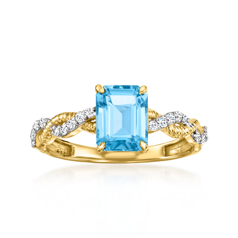 14kt yellow gold ring with square blue topaz center and diamond side accents