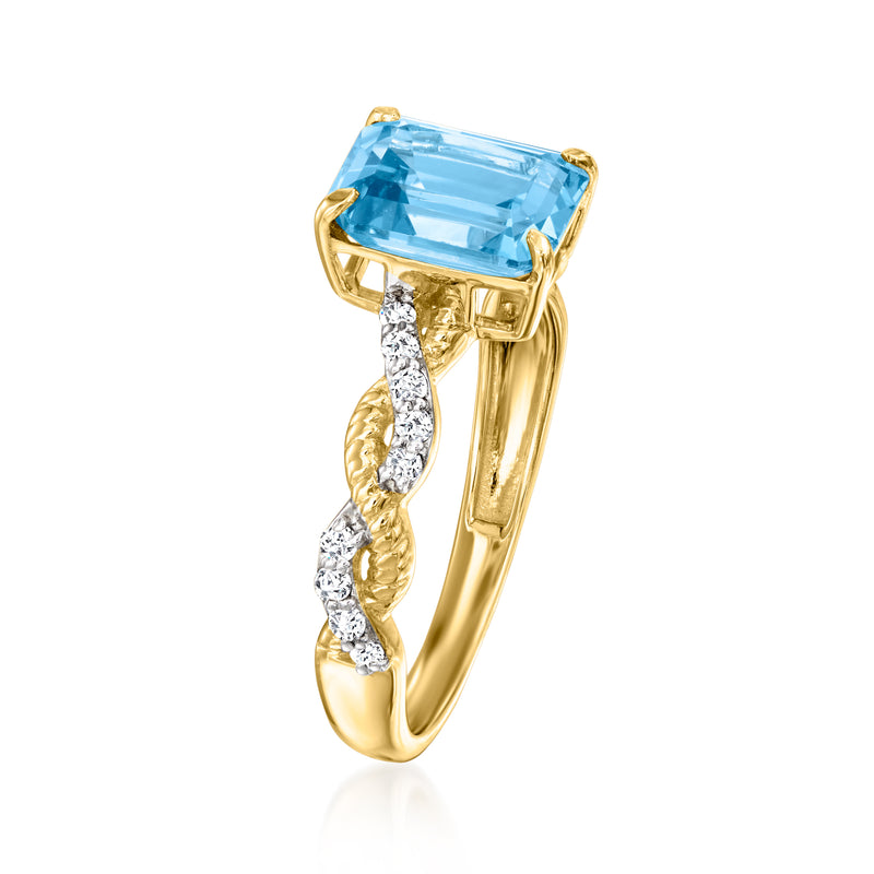 14kt yellow gold ring with square blue topaz stone and curving diamond band