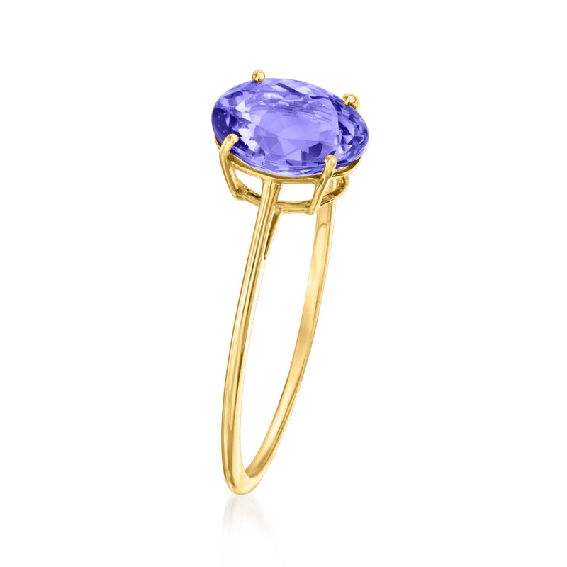 Oval tanzanite ring, 14kt yellow gold band with prong-set blue gemstone