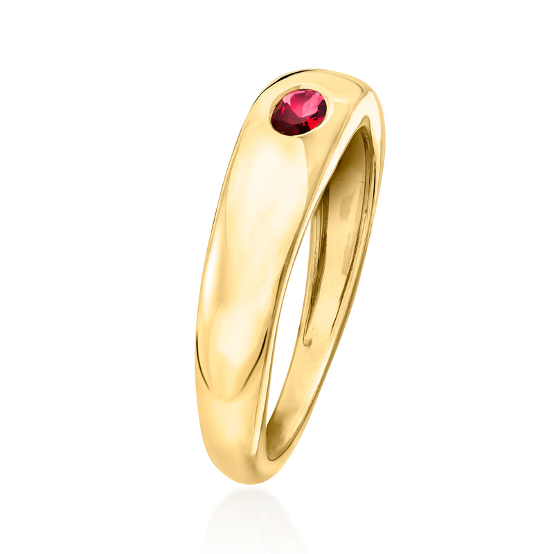 Gold oval ring side view with small oval ruby bezel on slender band