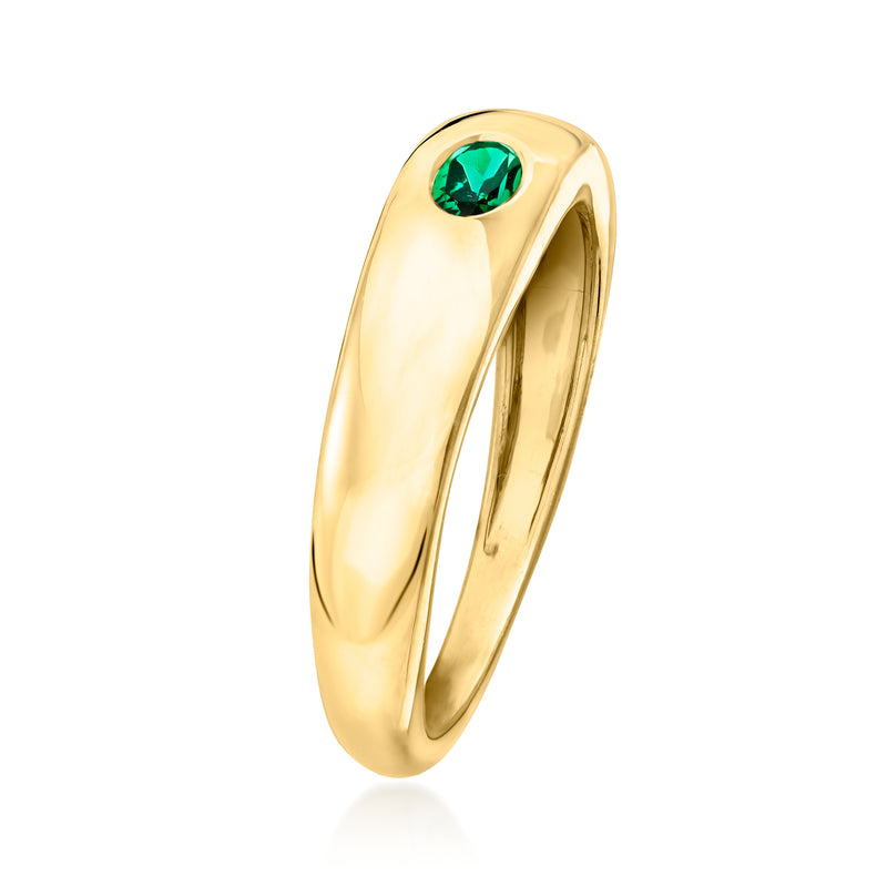 Gold over sterling oval emerald ring viewed from the side with green stone