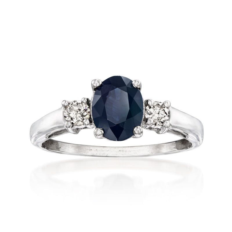 Vintage sapphire and diamond ring in 14kt white gold, dark blue center stone