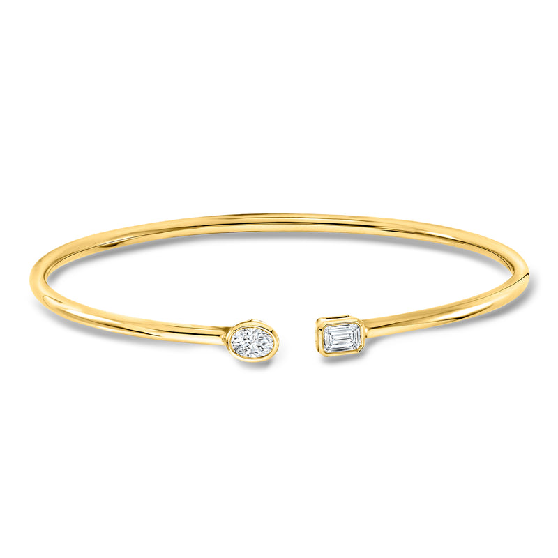 Gold diamond cuff bracelet with round and baguette crystal accents, hinged front