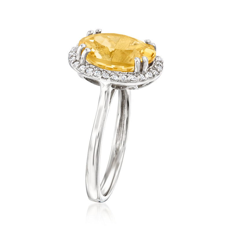 Sterling silver oval citrine ring with diamond halo, side view