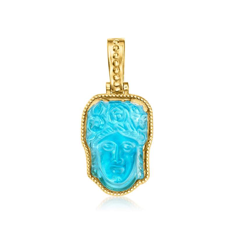 Gold-tone pendant with blue Venetian glass face in ornate bezel setting