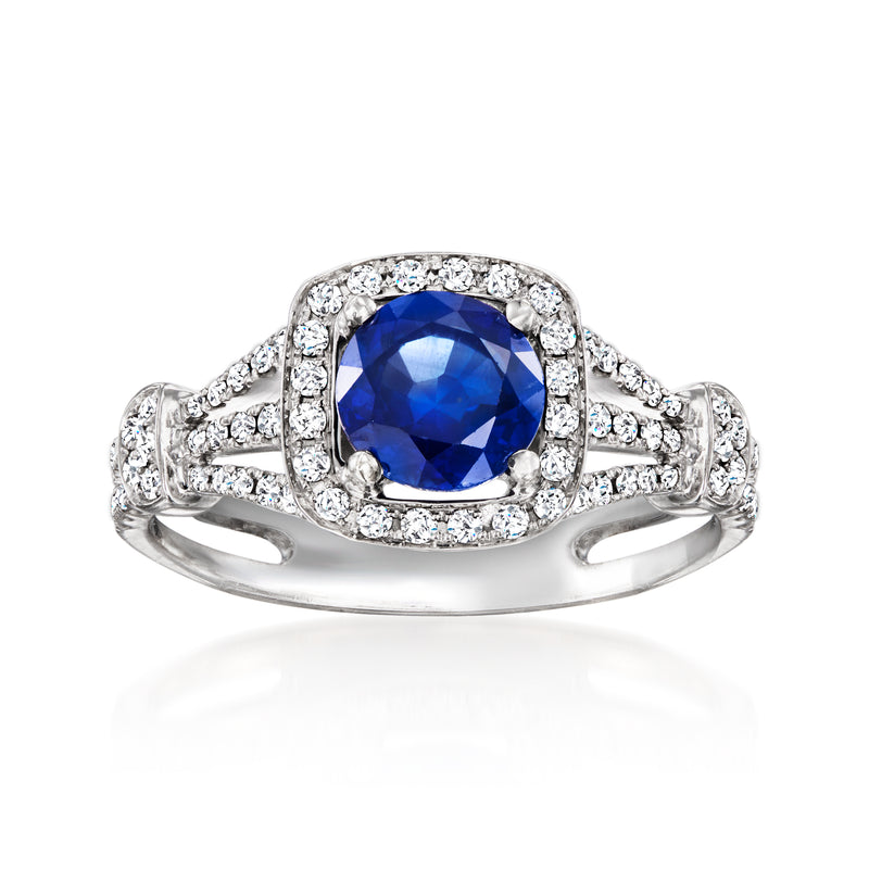 Sapphire ring in 18kt white gold with diamond halo and split shank