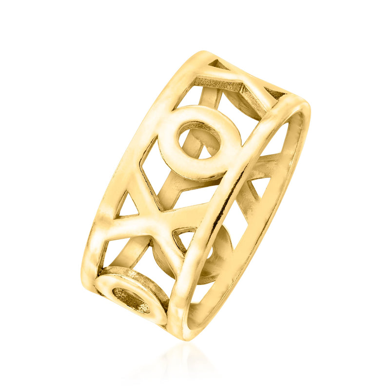 Gold XO ring, angled view, openwork X and O design on wide band