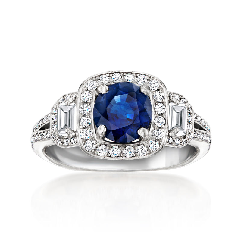 Platinum sapphire halo ring with round diamond accents and side diamond details