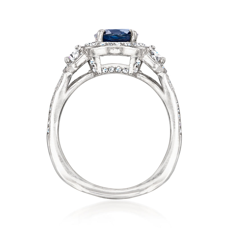 Platinum sapphire ring view from behind with diamond halo and raised prongs