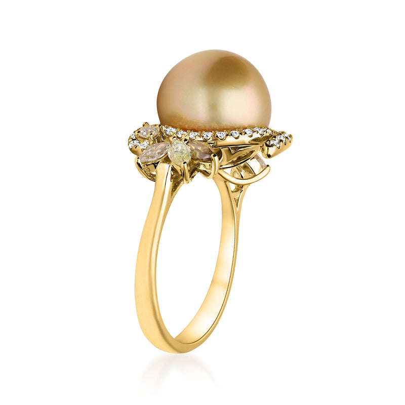 18kt yellow gold ring showing side prongs around golden cultured pearl with diamond band