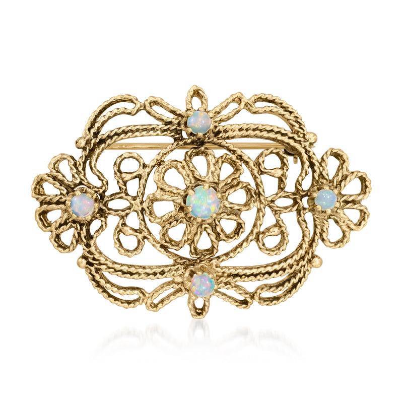 14kt yellow gold openwork vintage pin with opal-like round stones