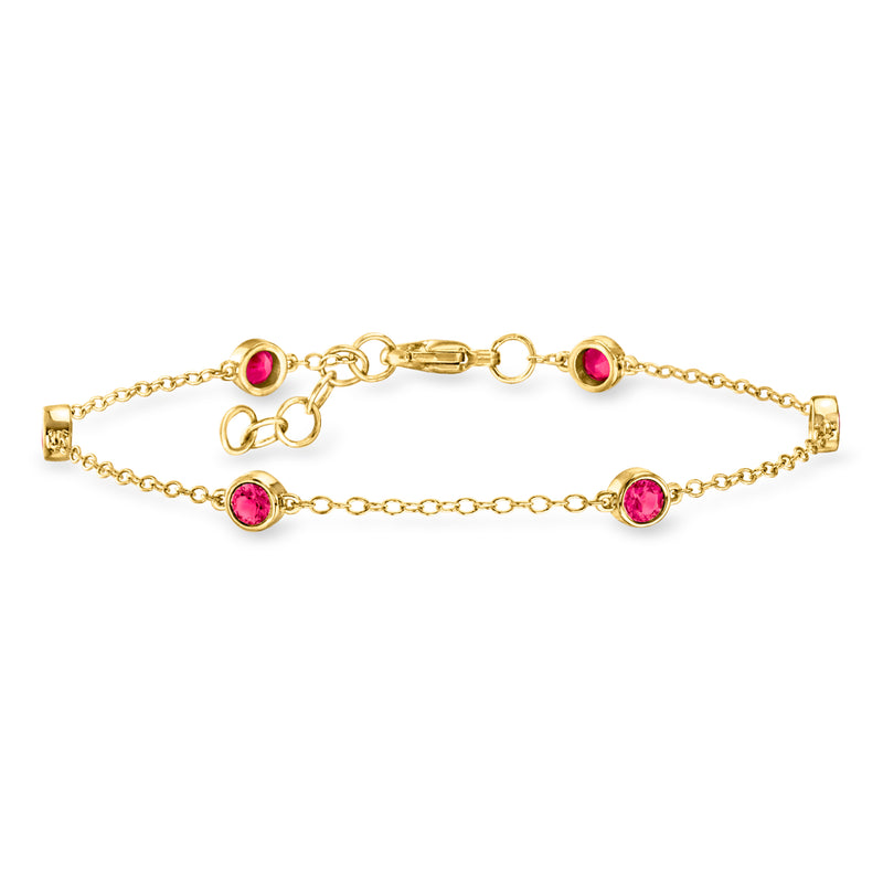 Gold station bracelet with round pink gemstones and link chain with lobster clasp