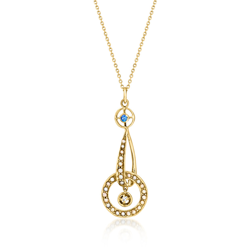 14kt yellow gold pendant necklace with seed pearls, round sapphire center and diamond.