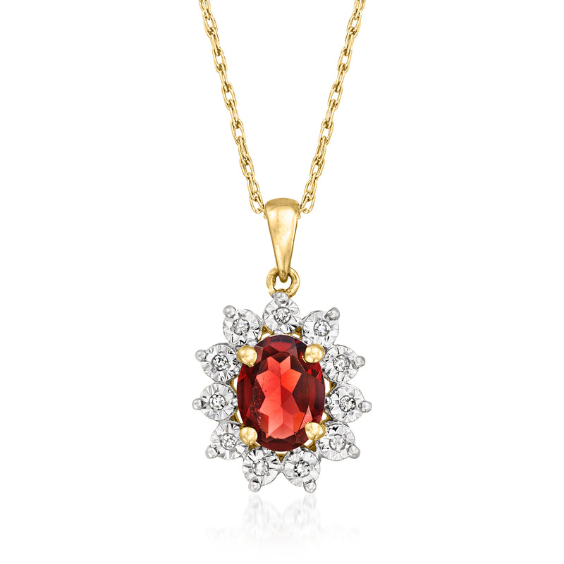 Vintage garnet pendant necklace in 14kt yellow gold with diamond halo
