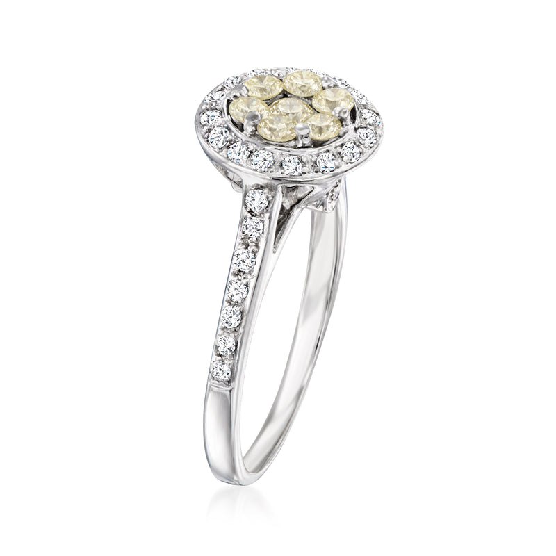 Vintage yellow and white diamond cluster ring with pavé band in 18k white gold