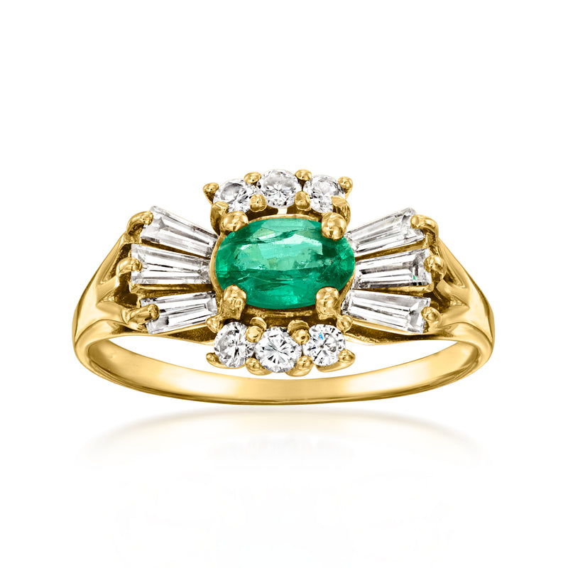 Vintage emerald-cut green gemstone ring in 18kt yellow gold with diamond accents