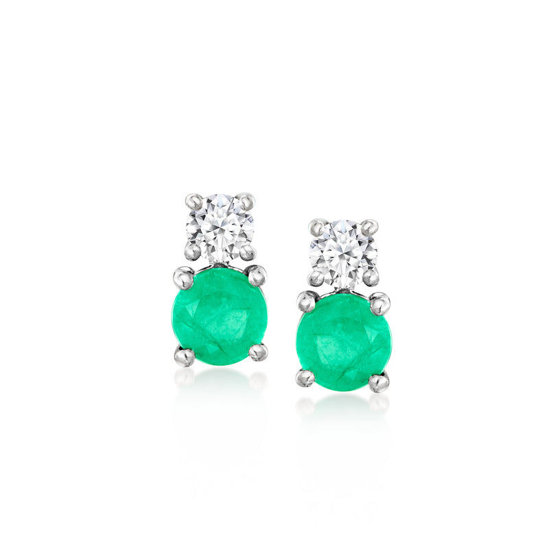 Platinum post earrings with emerald-green oval stones and white diamond accents