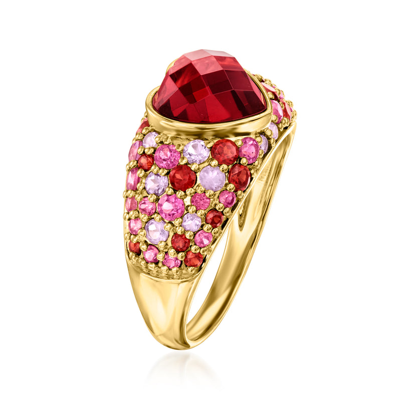 Heart-cut red gemstone top ring with side cluster of pink, red, and purple stones