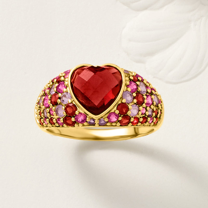 Heart-shaped red center gemstone ring with pink, purple, and red clustered bands
