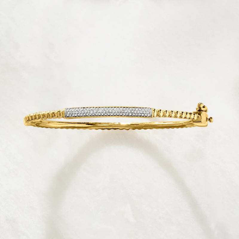 Diamond bar bangle bracelet in gold over sterling with pavé center bar and hinged clasp