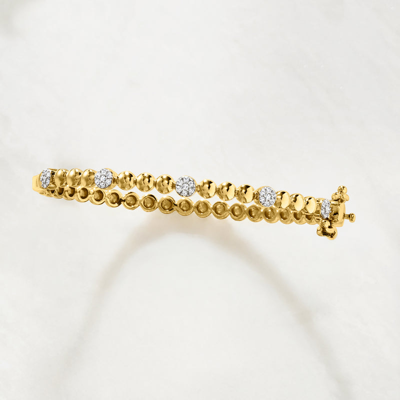 Diamond bead bangle bracelet with round gold beads and small clear stone accents