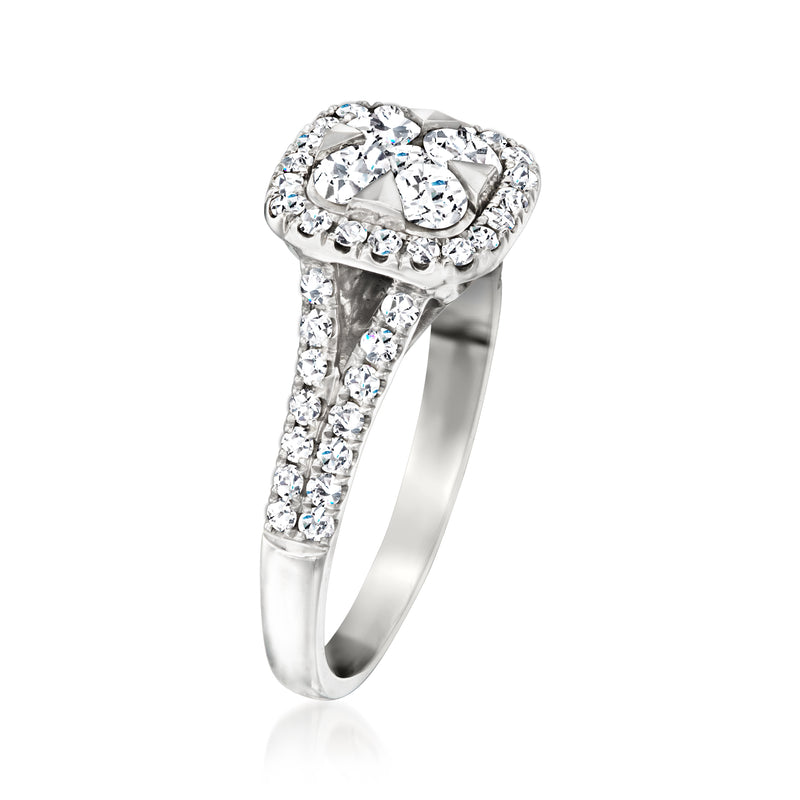 C. vintage diamond ring in 14kt white gold with halo and pavé shoulders