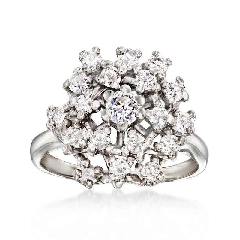 Cluster diamond ring in 14kt white gold with round stones, high-set halo