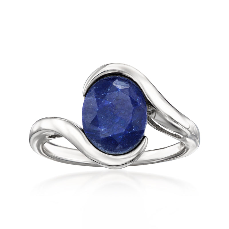 Sterling silver ring with oval dark-blue sapphire center stone, twisted band