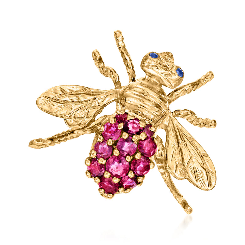 14kt yellow gold bee pin with ruby cluster body and sapphire blue eyes