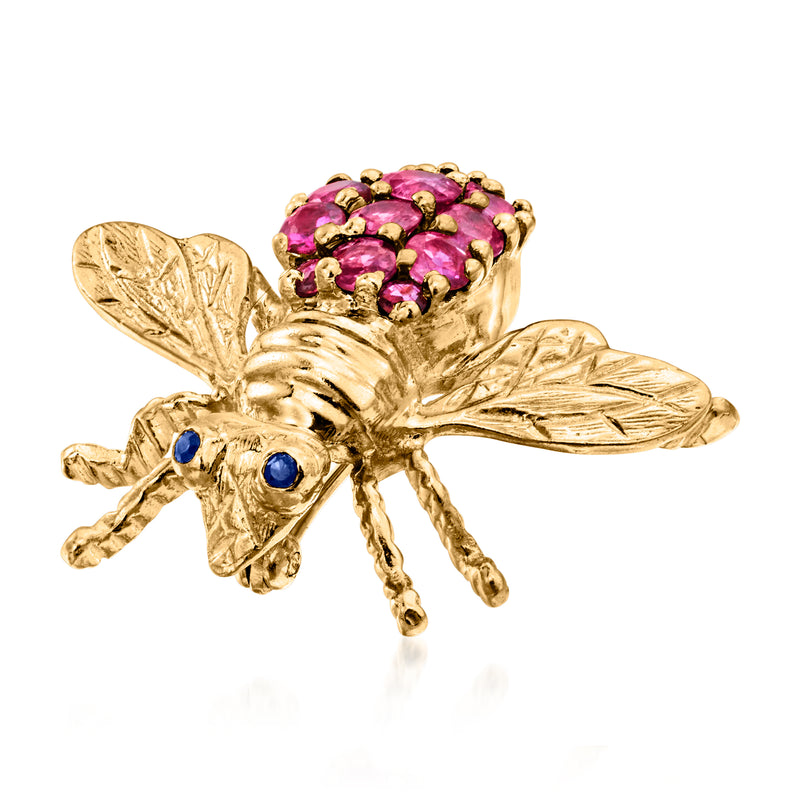 Gold bee pin detail: ruby cluster body, blue sapphire eyes, leaf wings