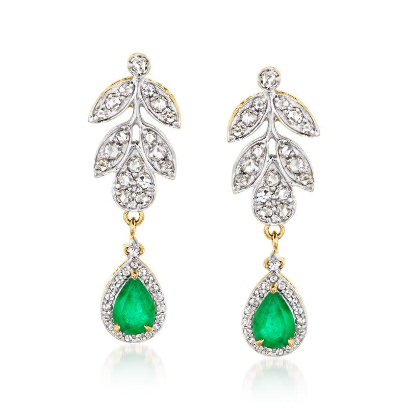 Two-tone gold drop earrings with diamond leaf clusters and green emerald teardrop drops