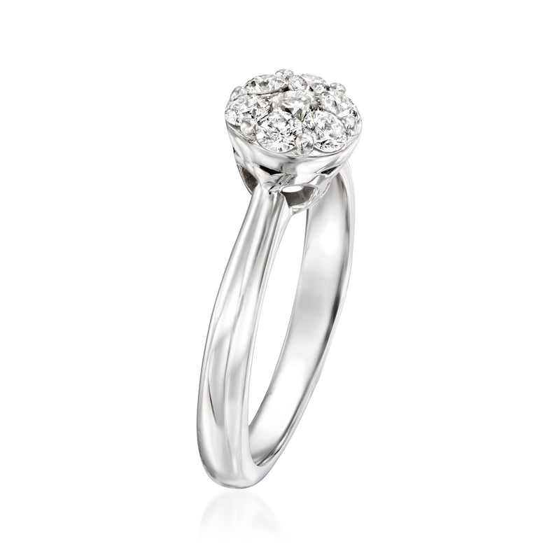 14kt white gold diamond cluster ring with round stone cluster and high setting