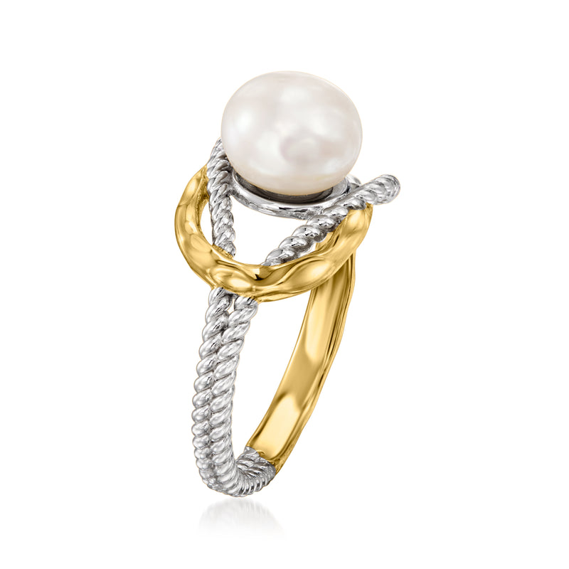 White pearl ring with twisted rope silver band and gold-tone bezel, open sides.