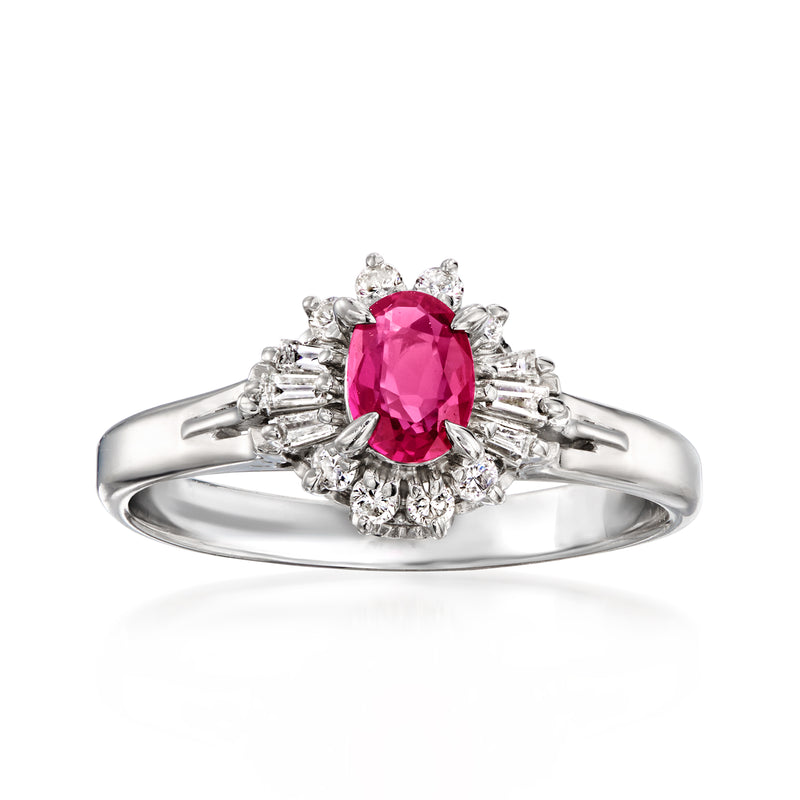 Platinum ruby and diamond vintage-style halo ring with oval red center stone
