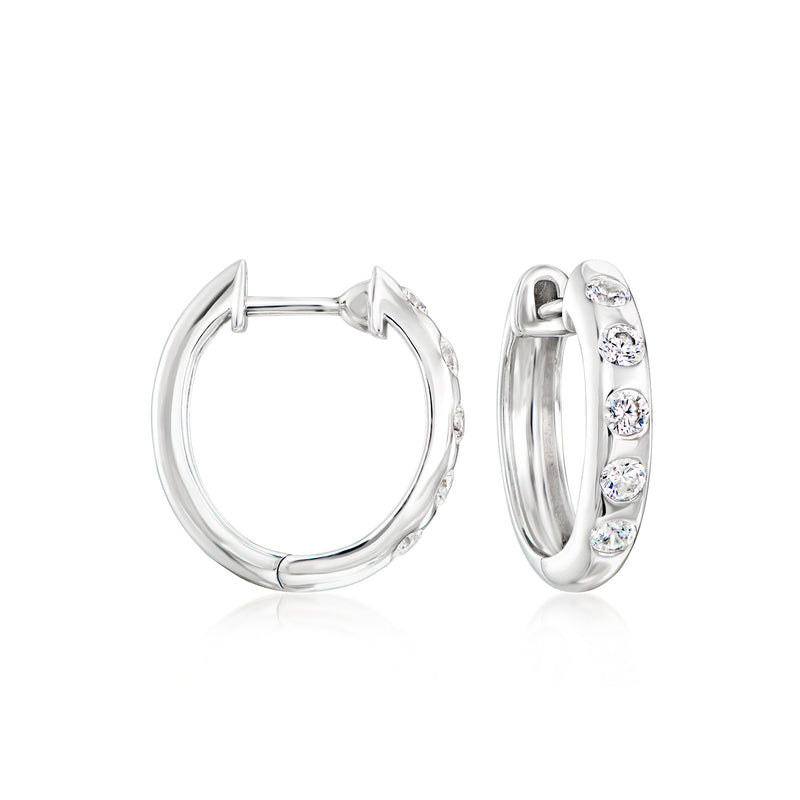 Sterling silver CZ hoop earrings with three round clear stones, hinged closure