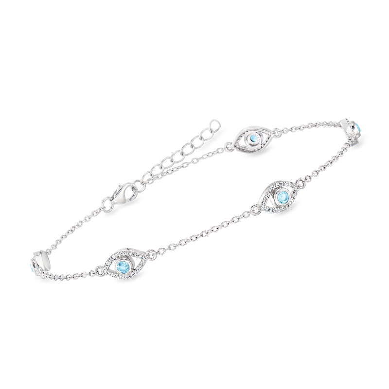 Sterling silver anklet with three evil eye stations and blue topaz accents