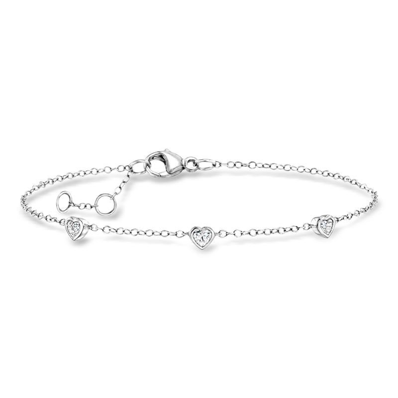 14kt white gold station bracelet with three heart-shaped lab-grown diamonds