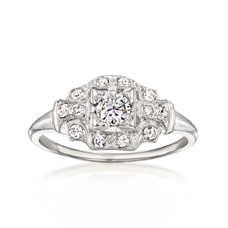 Vintage 14kt white gold diamond ring with round center stone and square halo