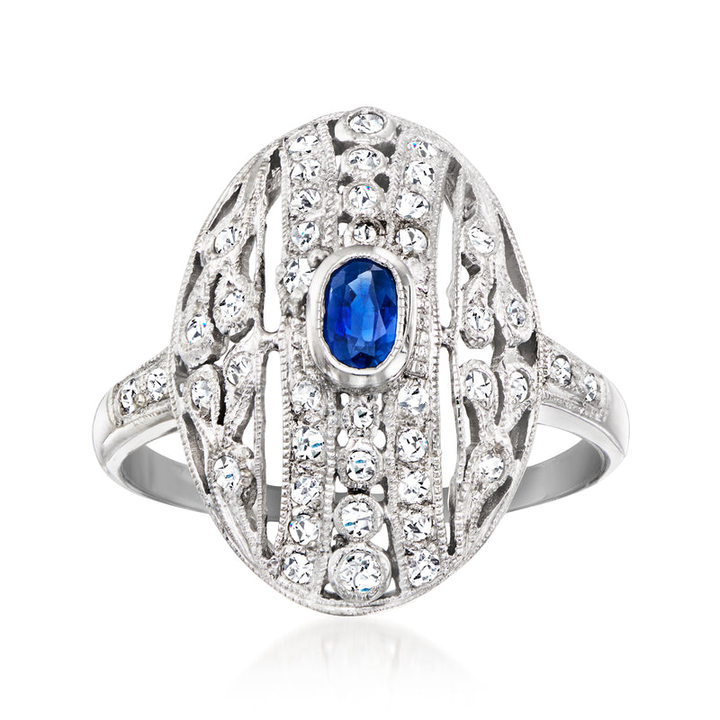 Sapphire and diamond vintage-style ring in 18k white gold, oval blue center stone