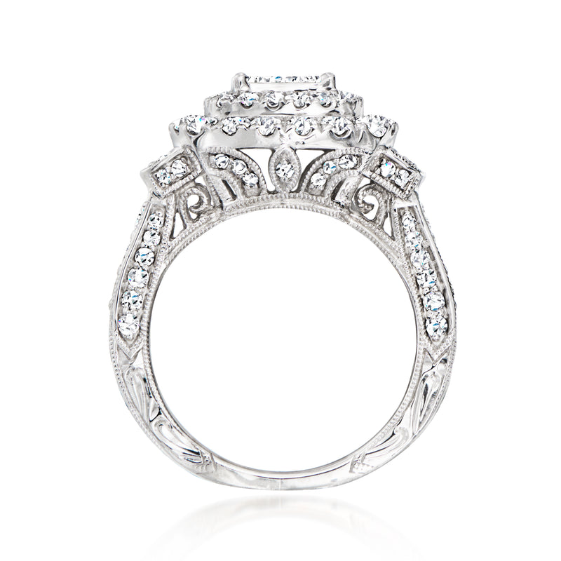 Diamond cluster ring in 14kt white gold with ornate vintage setting