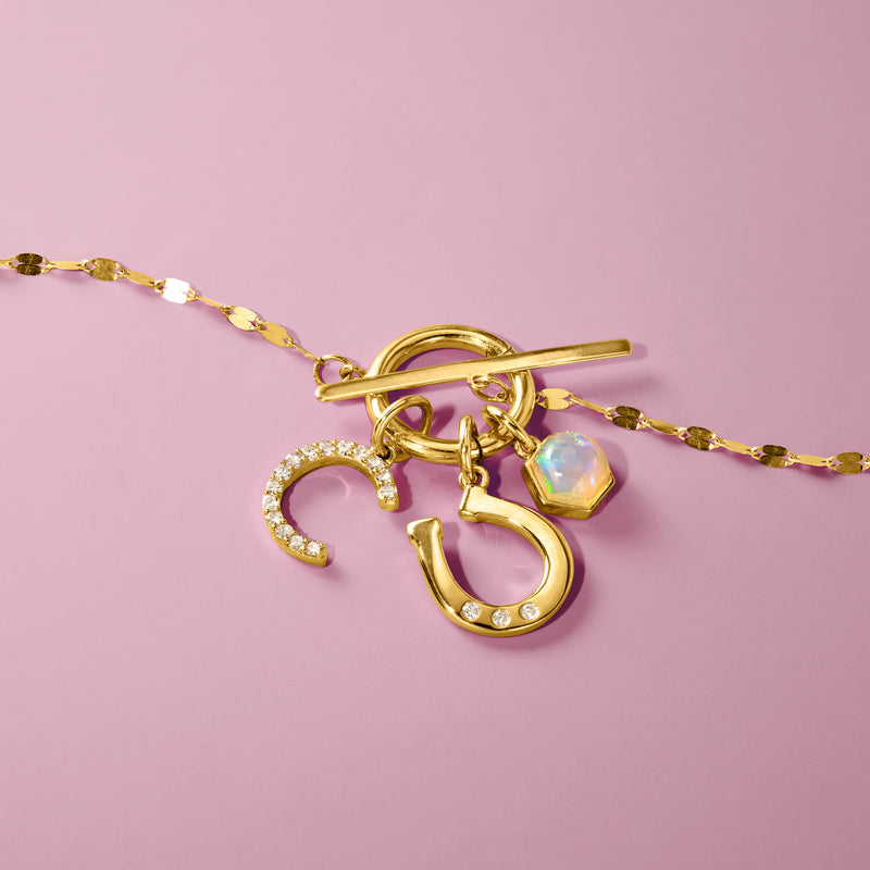 14kt yellow gold charm set with hexagon opal drop and stone 'S' initial